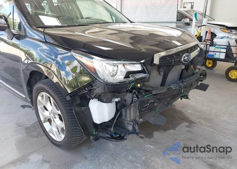 2018 Subaru Forester 2.5I Touring z USA, uszkodzony, nr VIN JF2SJAWC2JH574536